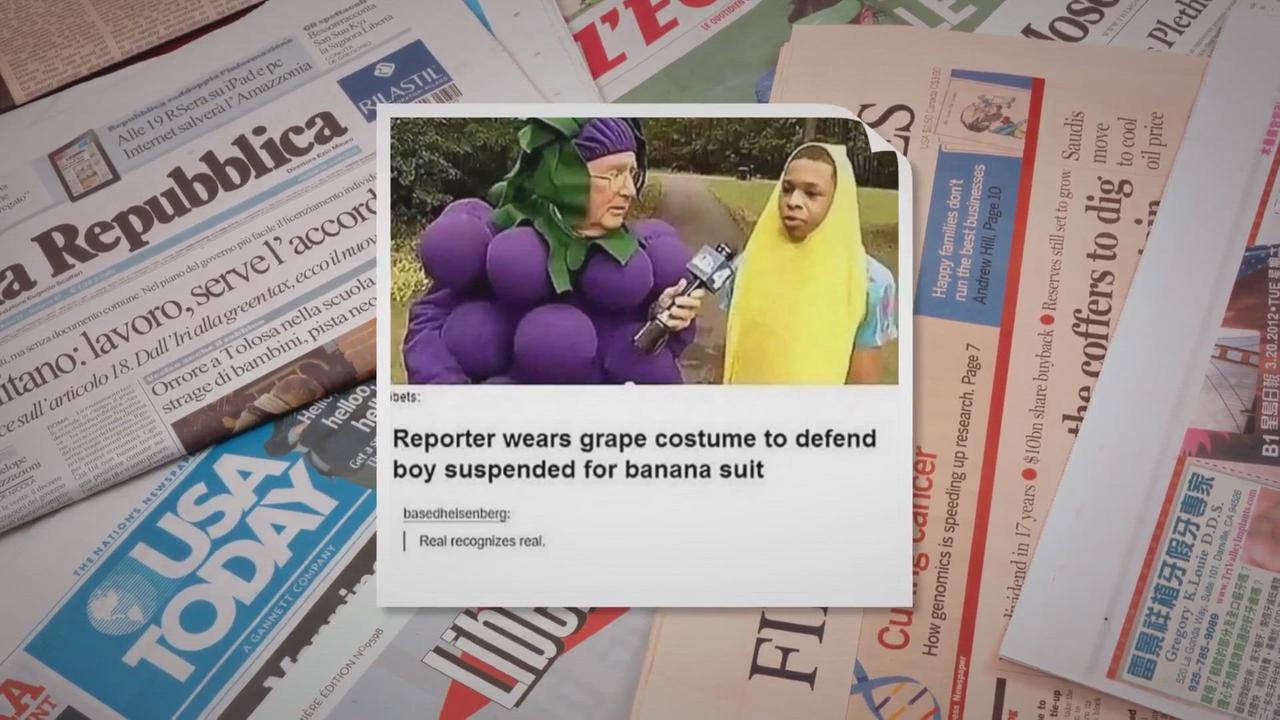 'Video thumbnail for ‘Reporter Wears Grape Costume to Defend Boy Suspended for Banana Suit’'